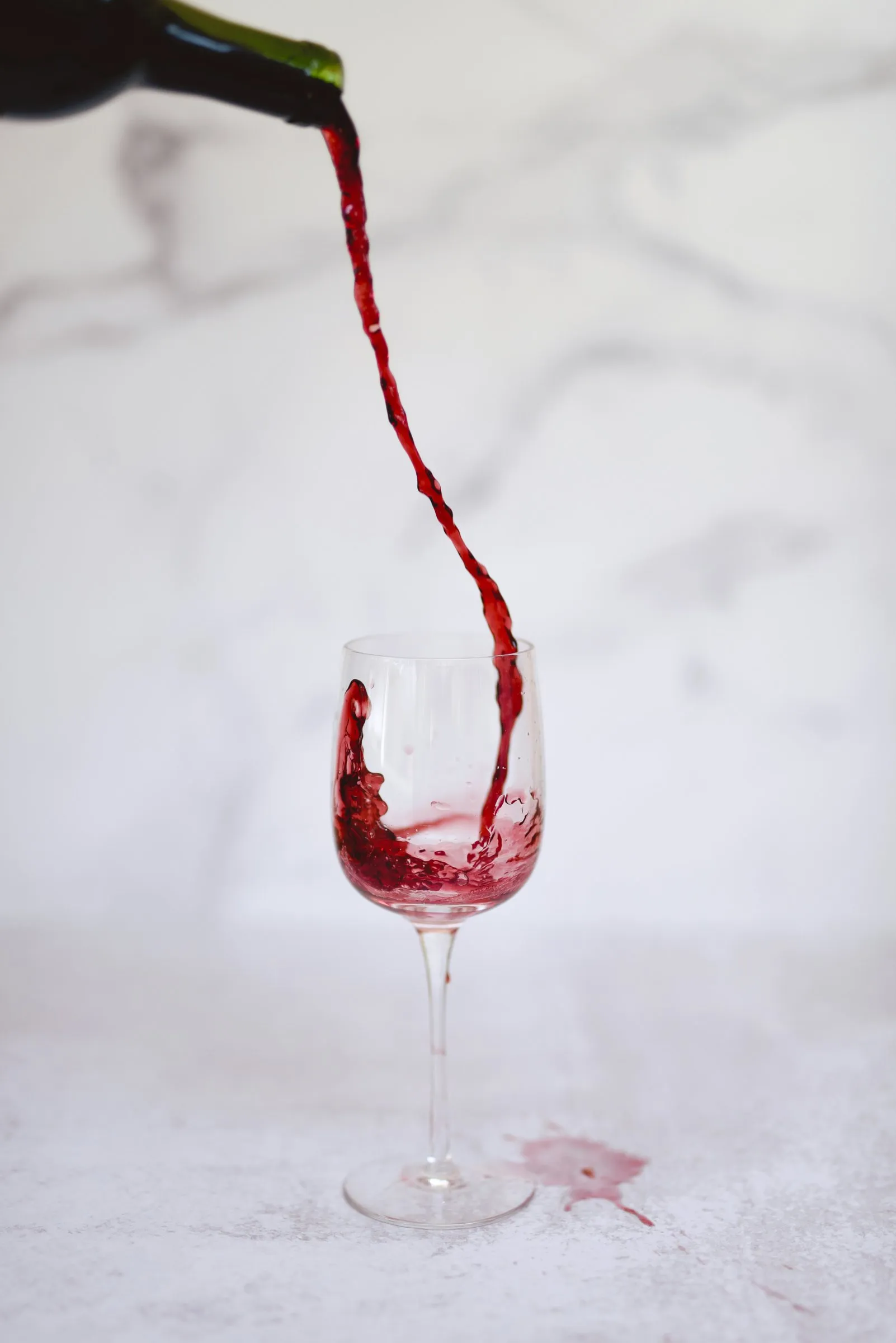 Red wine being poured into a glass